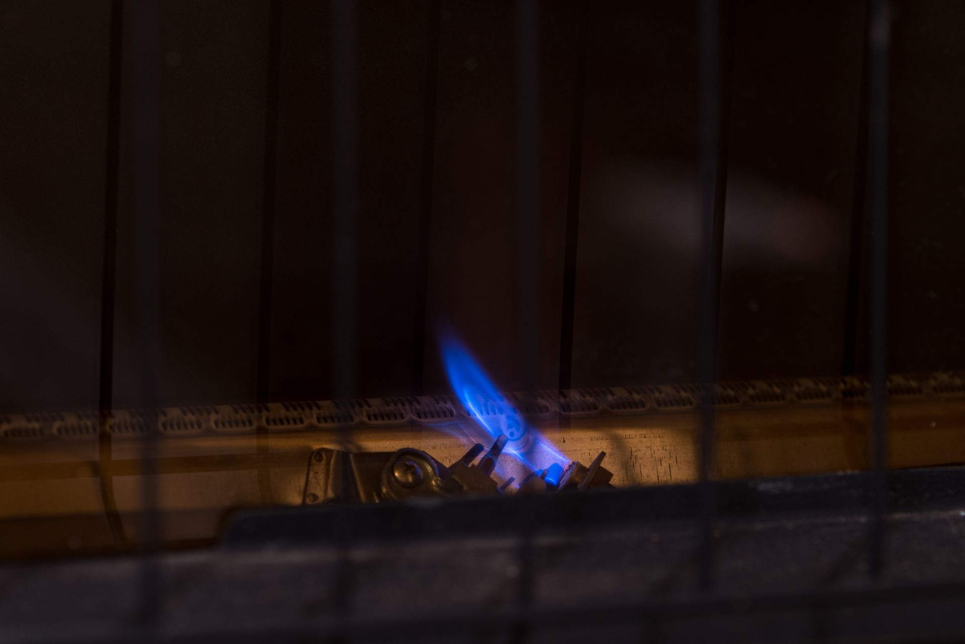 A pilot flame for a gas furnace heater demonstrates how HVAC technology has changed since 1986.