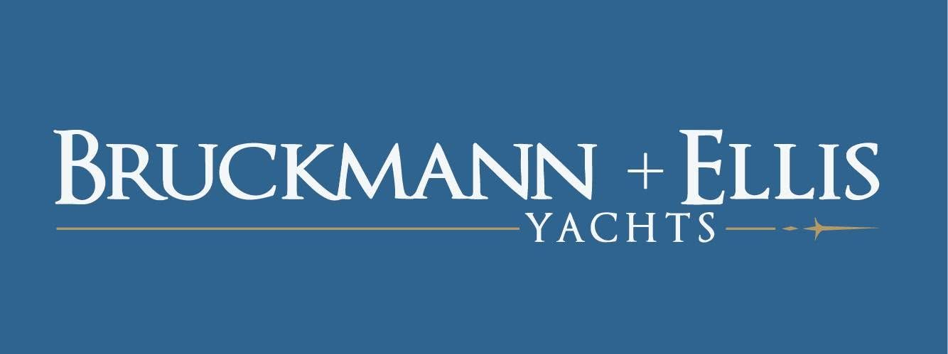 A blue logo for tartano yachts on a white background