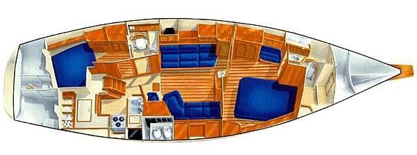 Top-down view of a sailboat's interior with blue seating and beds, and wood-paneled walls.