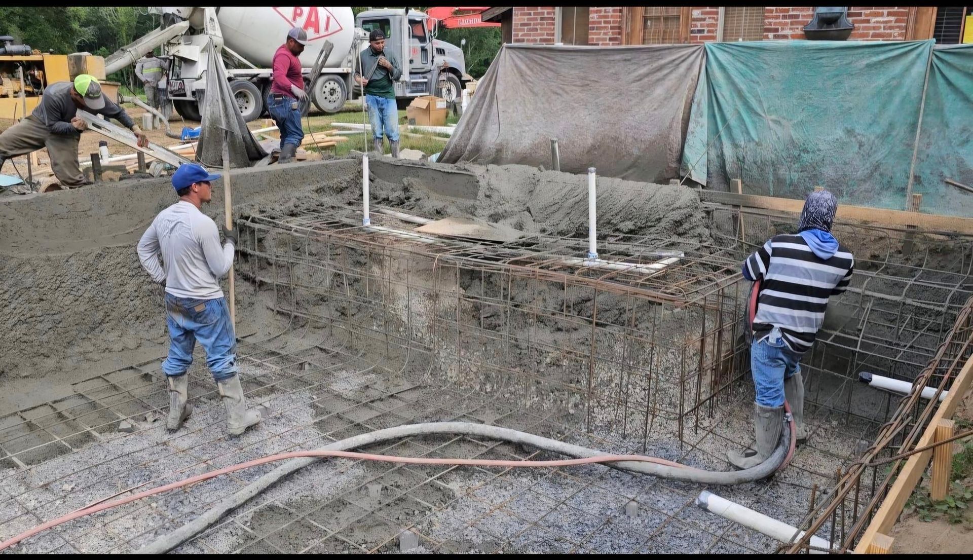 A group of construction workers are working on a construction site