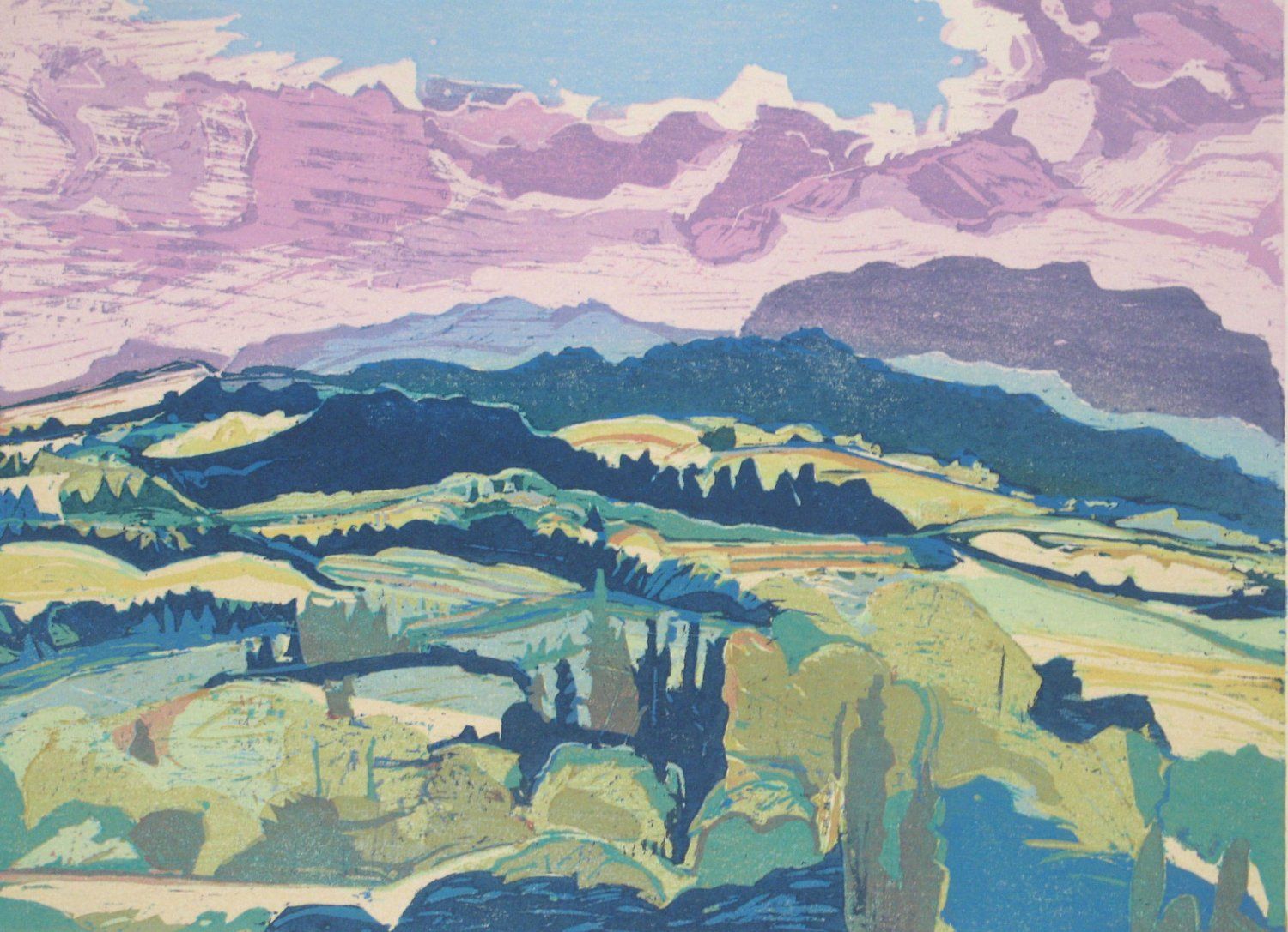 Rolling green and blue hills under a lavender and pink sky