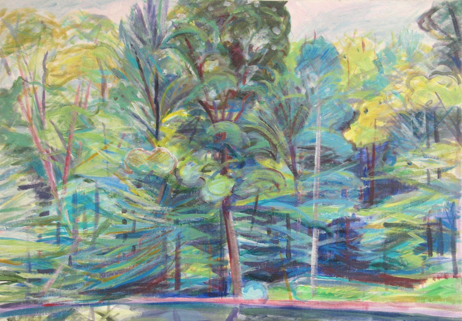Trees with green and yellow leaves reflected in a calm, dark blue water
