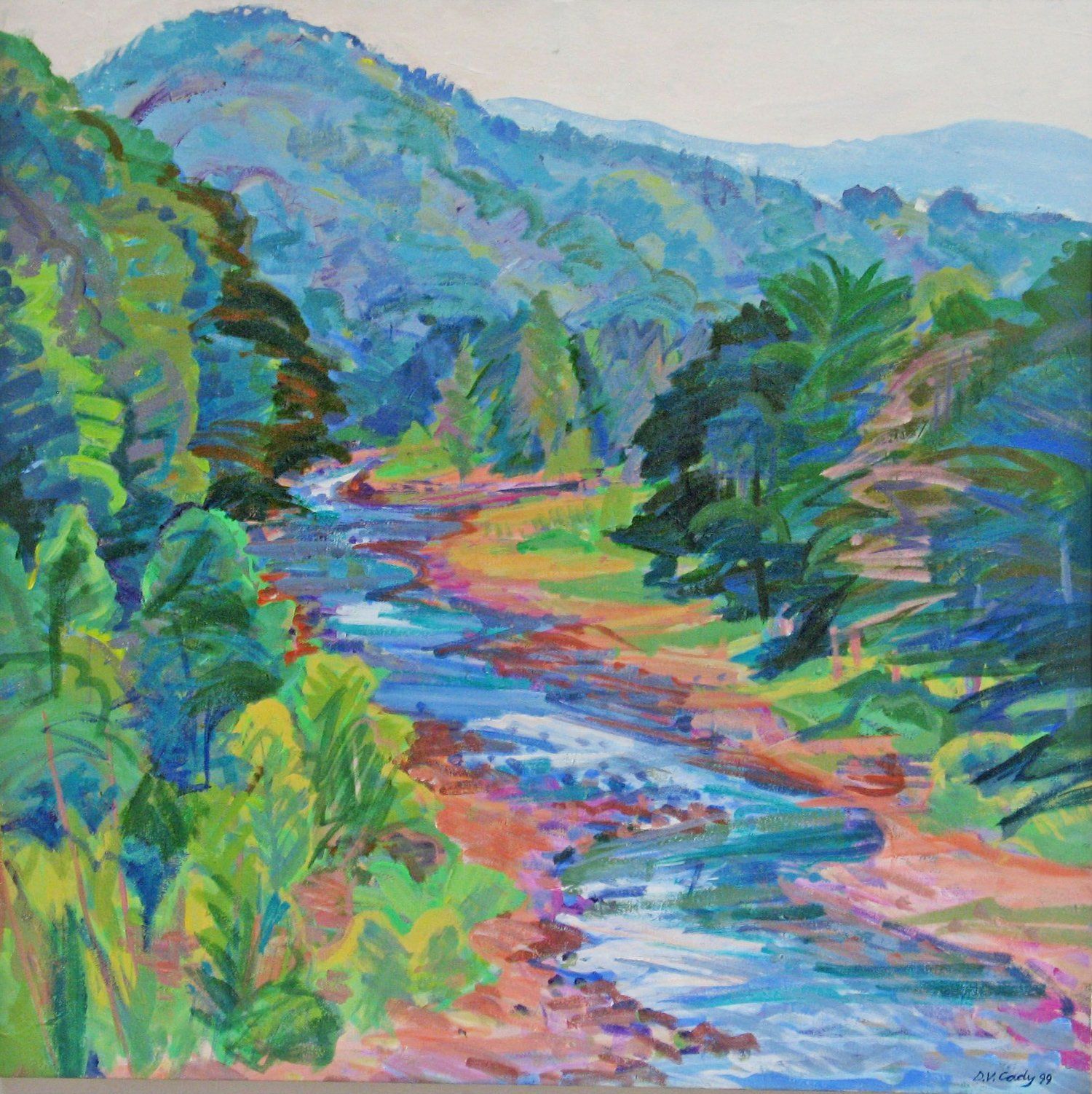 Mountain river flowing through a lush green valley