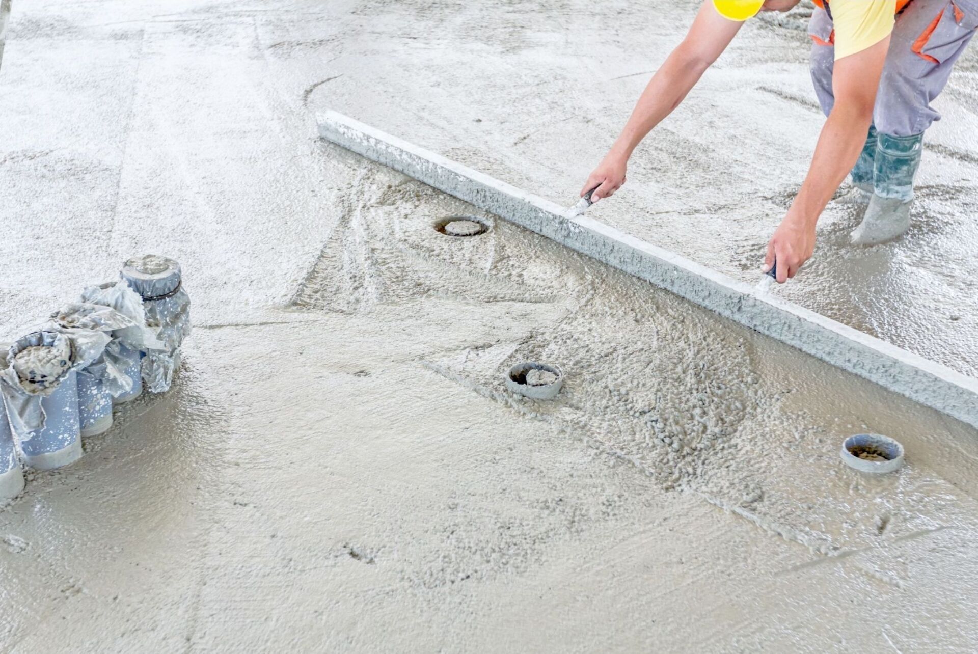 Concrete Installer working with foundational cement
