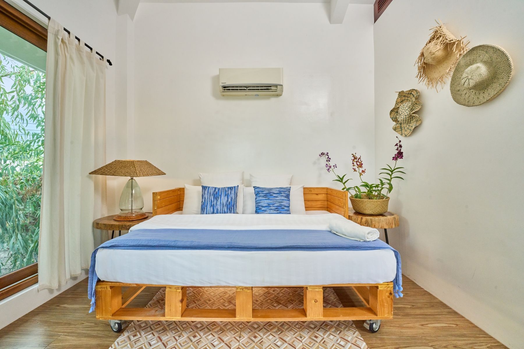 There is a large bed in the middle of the room.