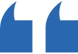 A pair of blue speech bubbles on a white background.