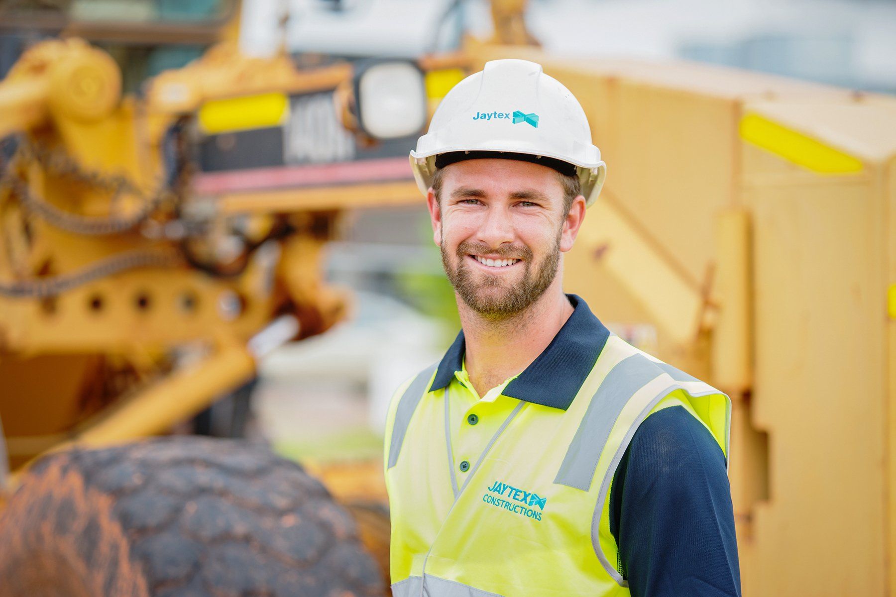 A smiling construction worker