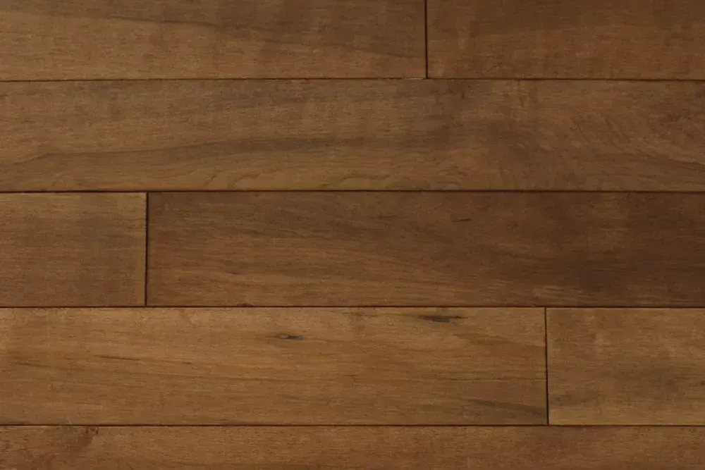 Detailed view of Crestwood Flooring, pre-finished hardwood, brandy maple.