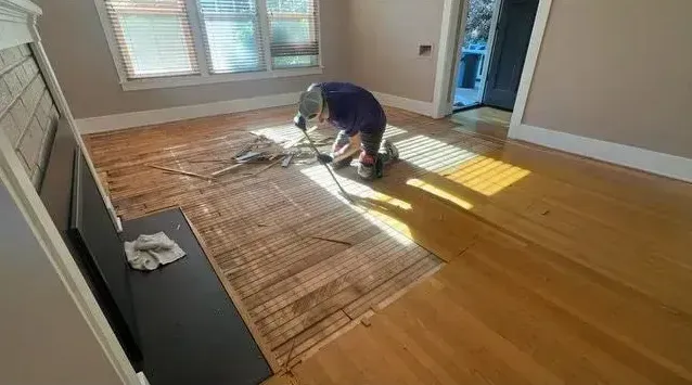 Man installing new floors.