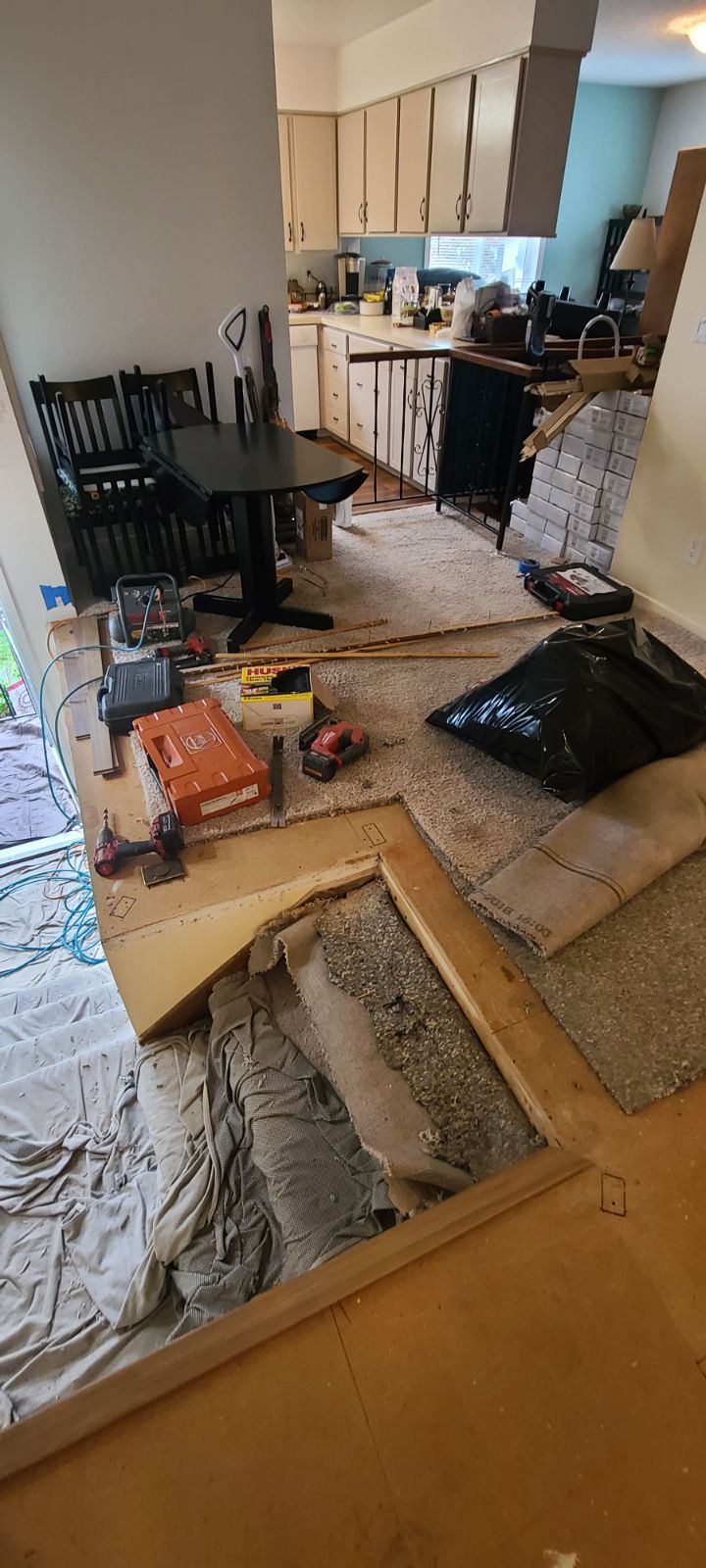 preparing flooring for replacement.