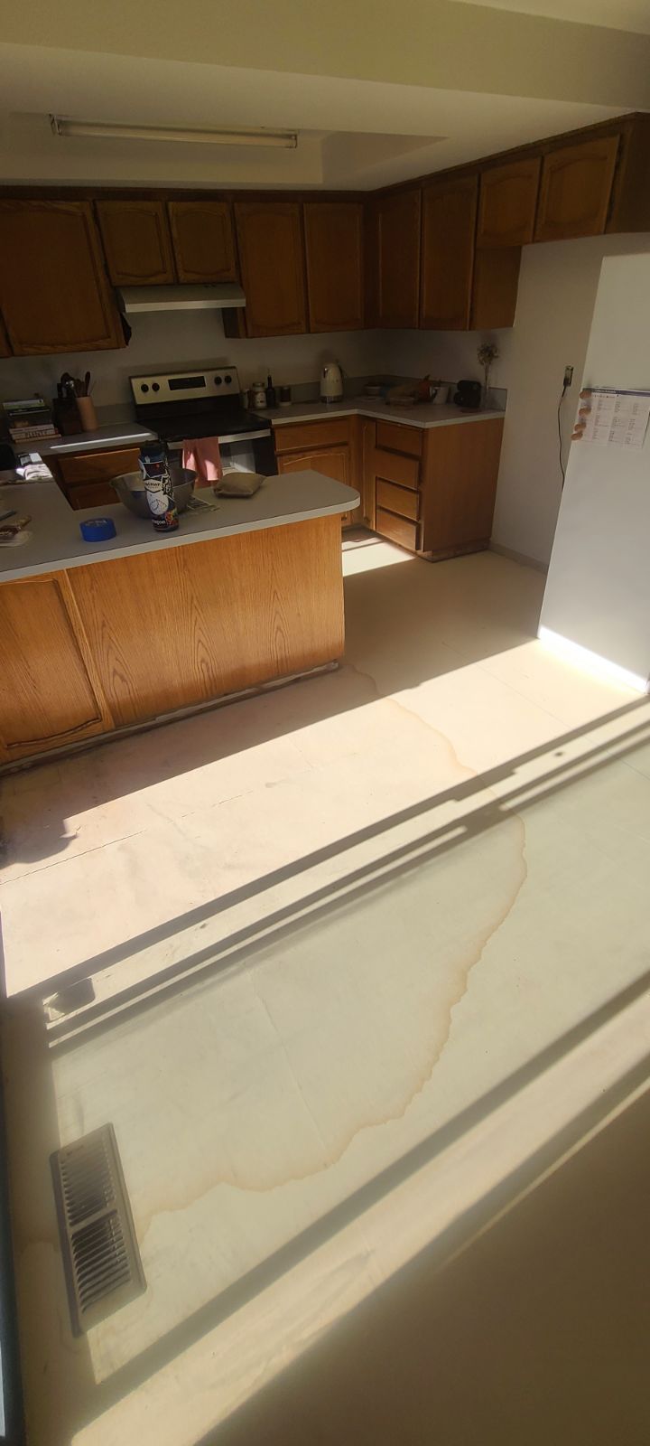 Kitchen before Orca laminate flooring installation.
