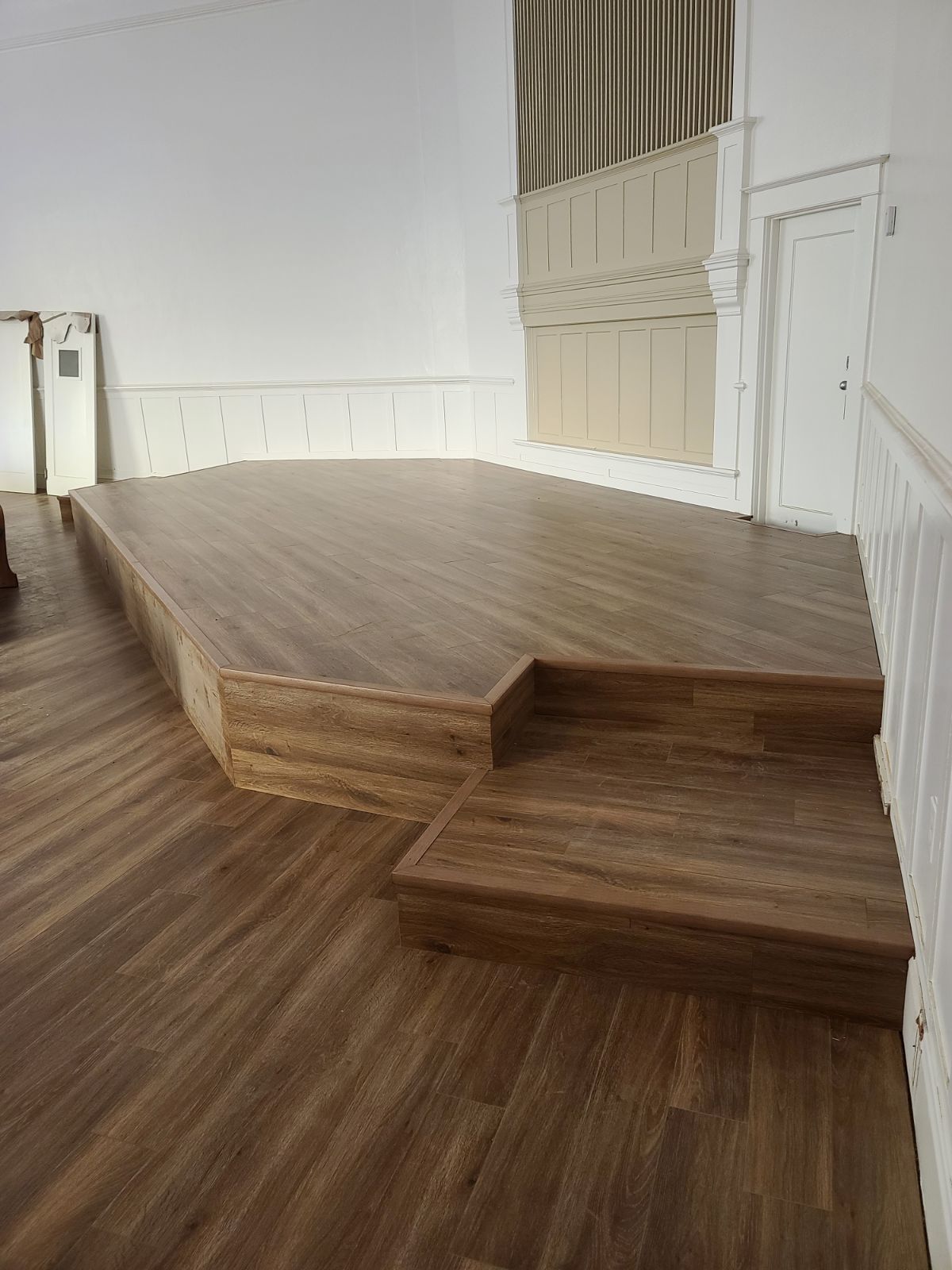 Right side of the church stage after flooring installation.