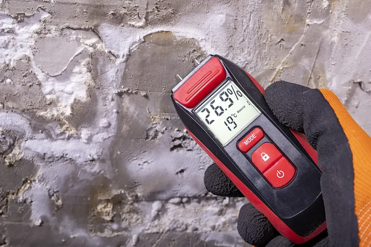 Testing moisture conditions of a concrete subfloor.