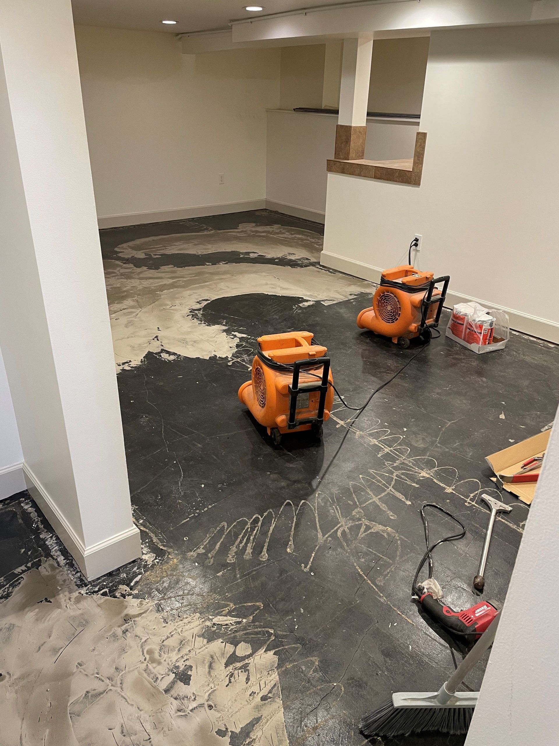 Waterproof basement flooring installation.
