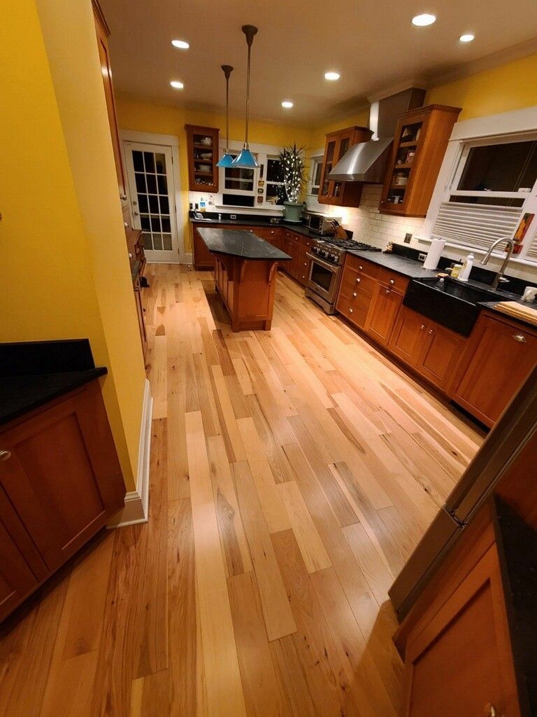 New Hallmark Floors Natural Hickory installed in a kitchen.