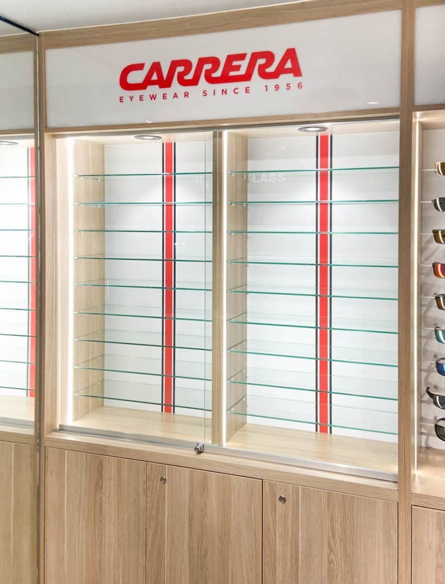 A Store Display Of Carrera Sunglasses And Sunglasses  — Solis Signs in Toukley, NSW