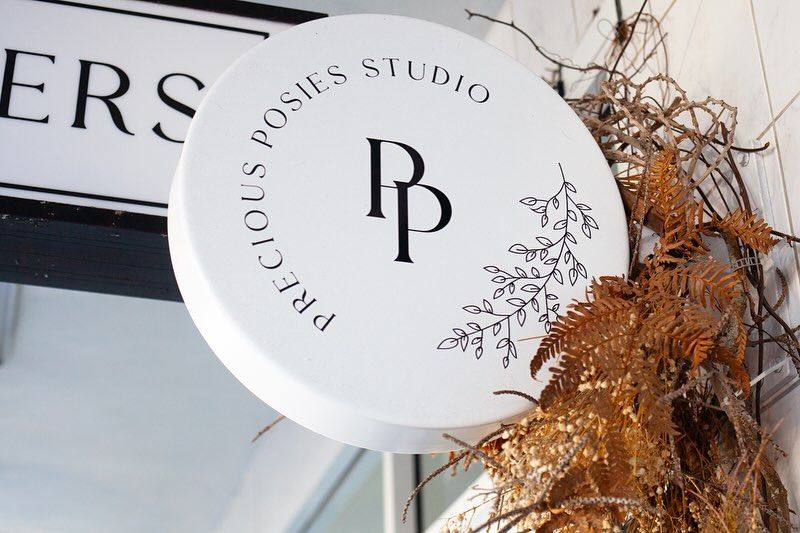 A White Sign That Says Precious Poses Studio On It  — Solis Signs in Toukley, NSW