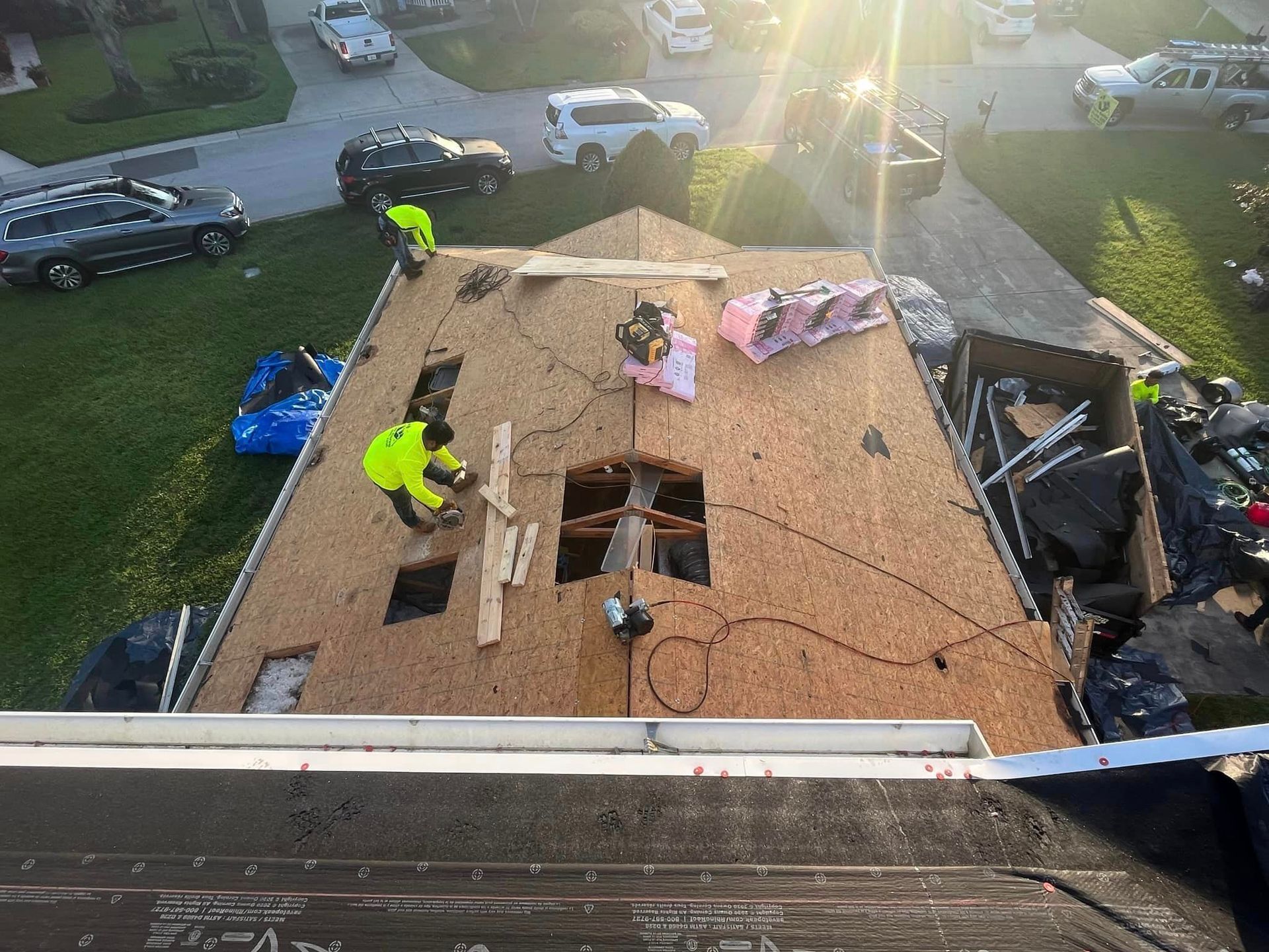 roofing contractors working on a roof