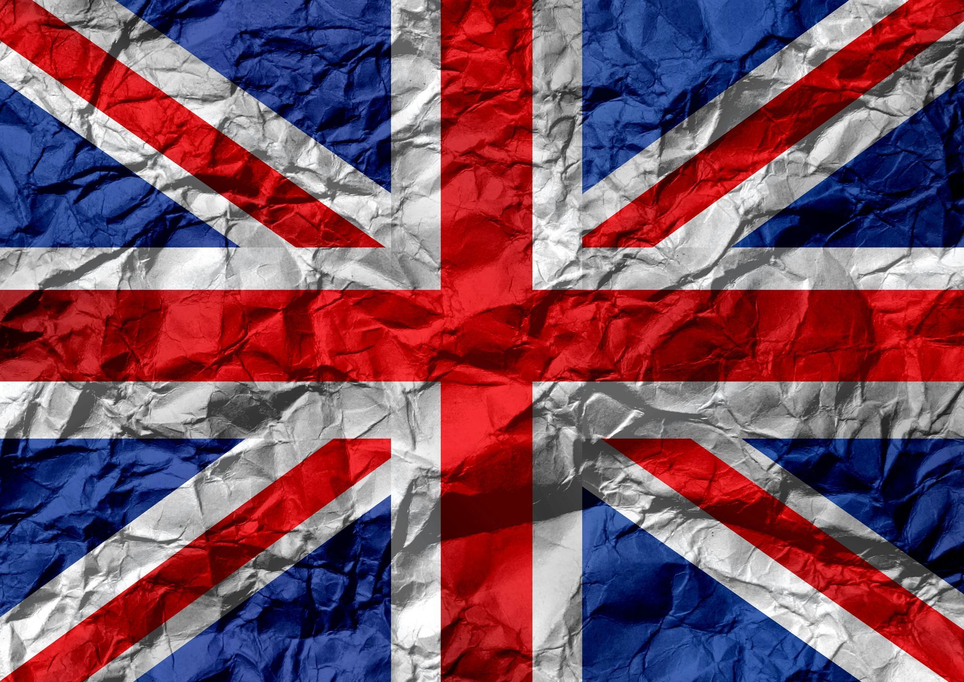 Union Jack flag with crumpled paper texture.