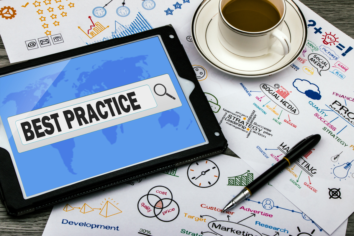 A cup and pen placed next to a tablet displaying the words 'Best Practice,' accompanied by key strategies and tips related to email marketing best practices, emphasizing the importance of effective tactics for successful campaigns.
