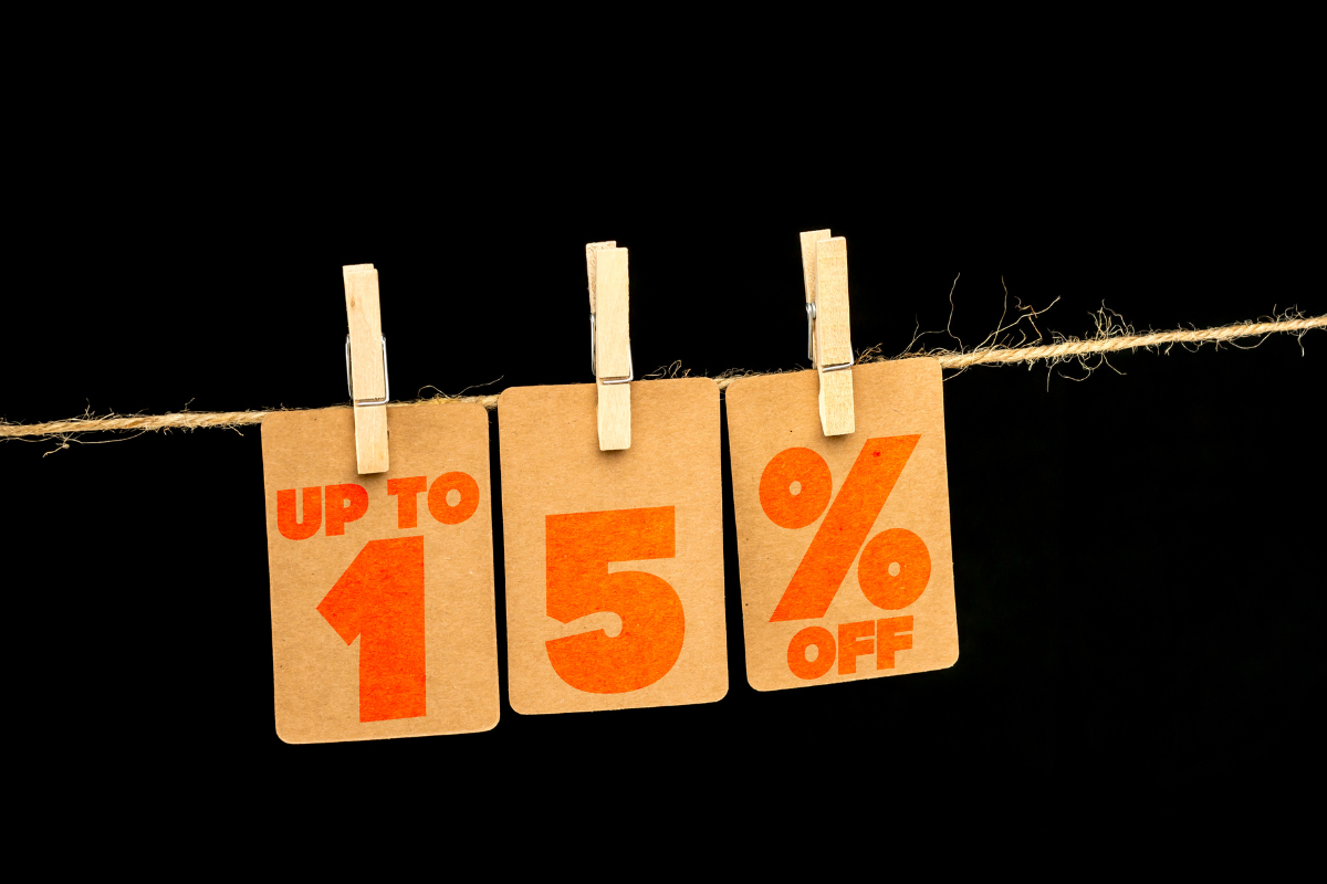 Tags hanging on a string with clothespins, displaying