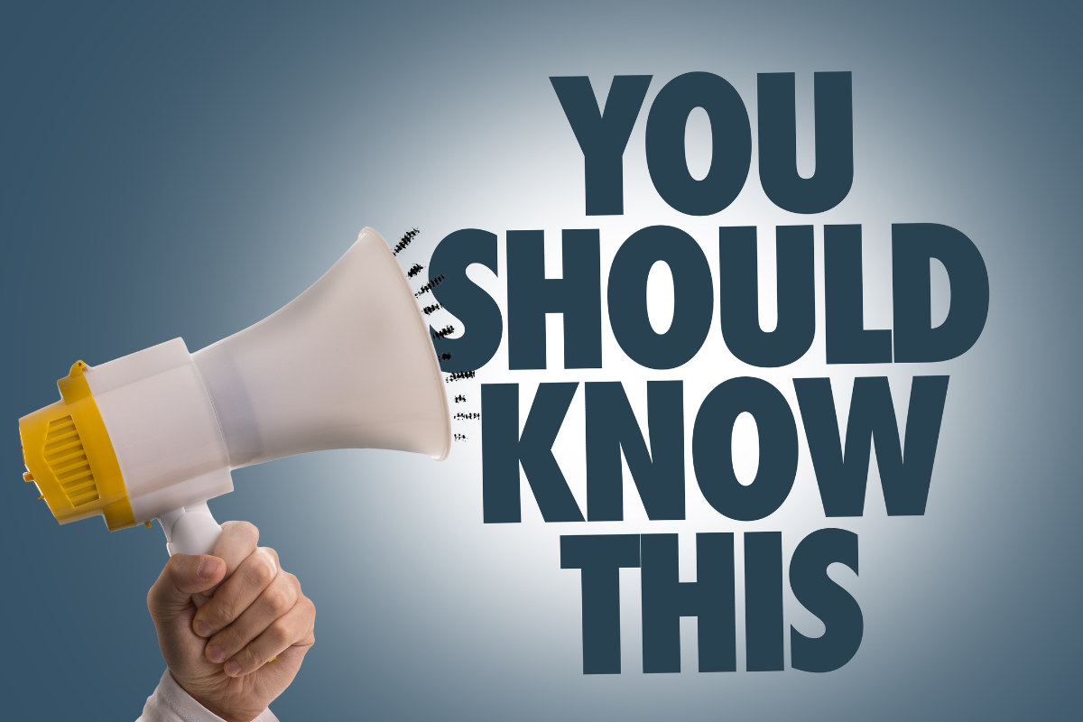 A hand holding a megaphone with the phrase 'You Should Know This,' highlighting emerging web development trends you should be aware of.