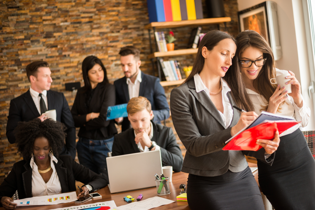 A diverse group of professionals collaborating together, representing a full-service marketing agency that acts as a vital growth marketing partner for businesses.