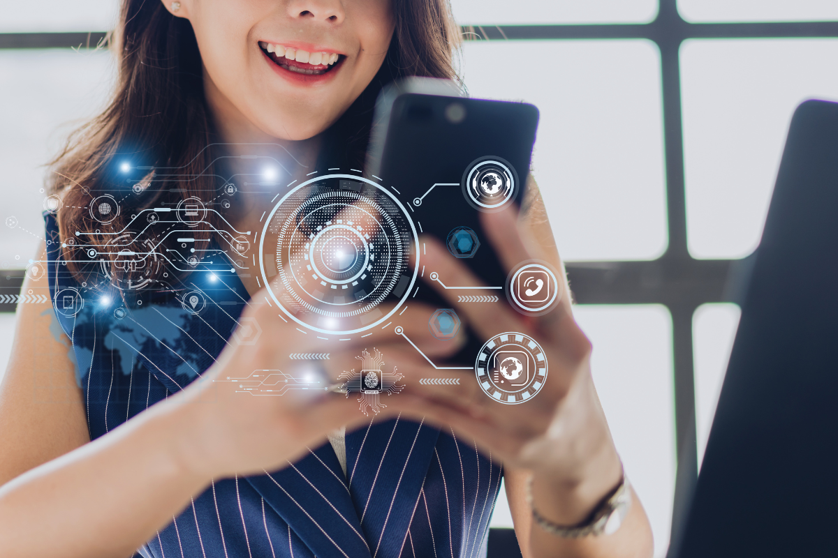 A woman happily holding her phone, emphasizing the importance of link building and showcasing strategies for executing effective internal link building to enhance website performance.
