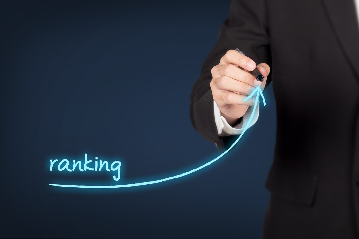 A person in a suit drawing an upward arrow labeled