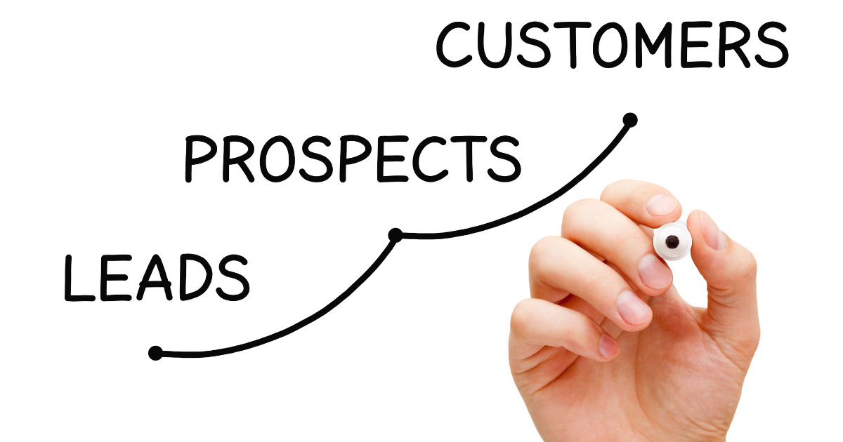 Hand drawing a growth curve from leads to prospects to customers, illustrating a predictive lead generation tool's impact.
