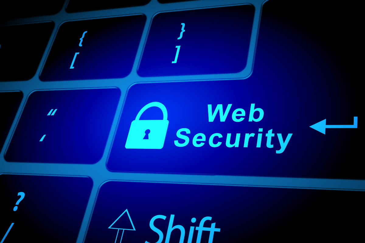 A close-up of a blue keyboard featuring the word 'Web Security,' highlighting the critical security considerations in modern web development, emphasizing the importance of safeguarding websites from vulnerabilities and ensuring safe user experiences.