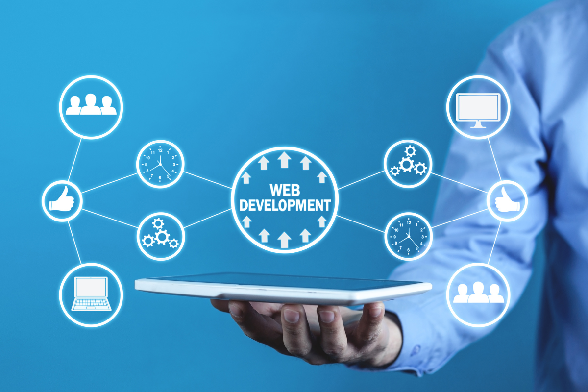 A man holding a tablet displaying a diagram of web development branches, symbolizing insights into the future of web development management and emerging trends shaping the industry.