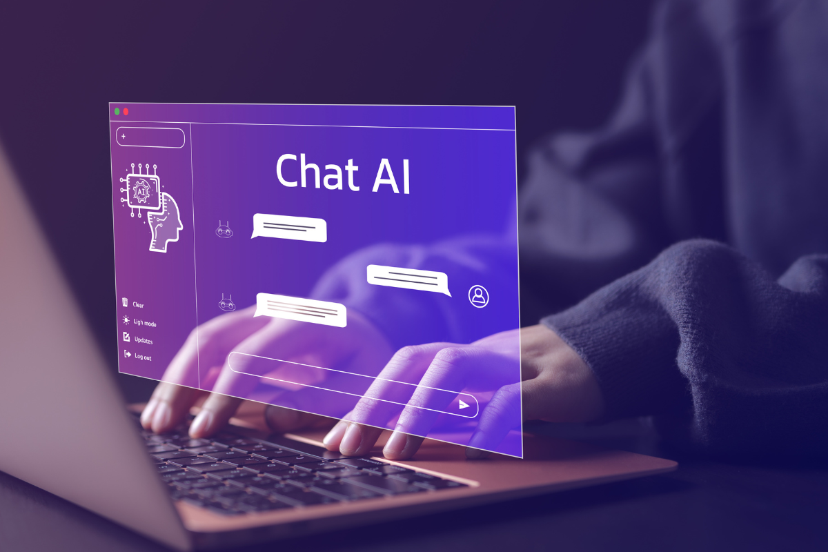 Person using a laptop with a futuristic Chat AI interface hologram, symbolizing AI conversations and technology.