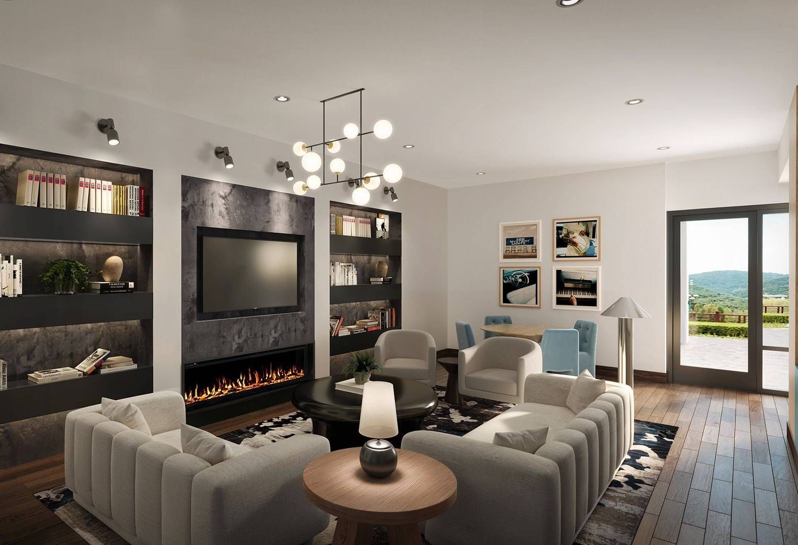 Modern living room with gray sofas, fireplace, wall-mounted TV, and large windows overlooking water