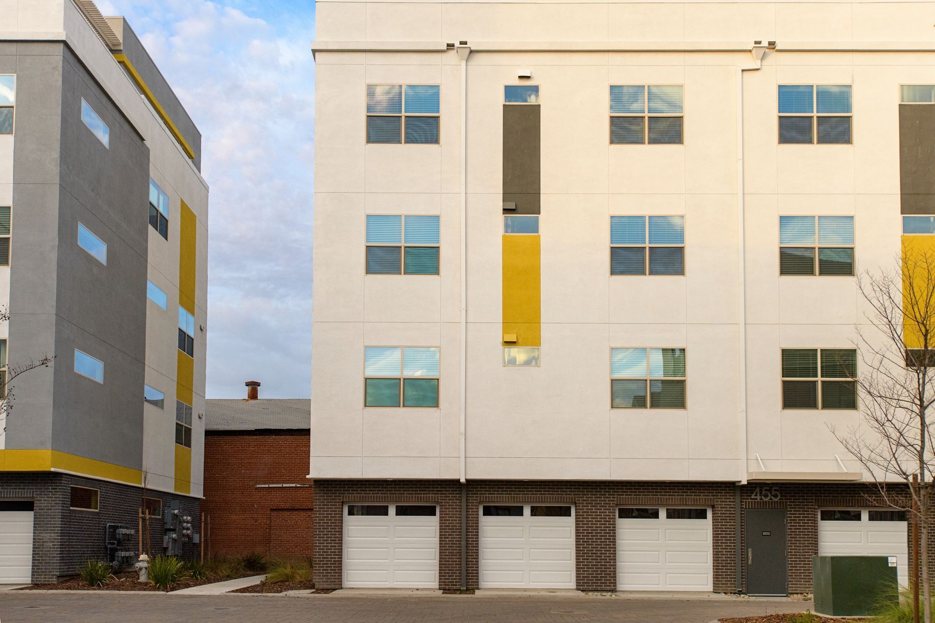 photo showing the garages and 3 levels of the building above