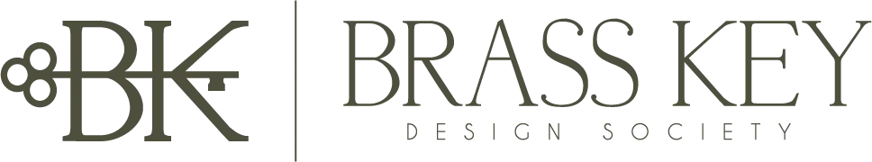 Brass Key Design Society logo with stylized BK monogram and text in gray and gold on white background