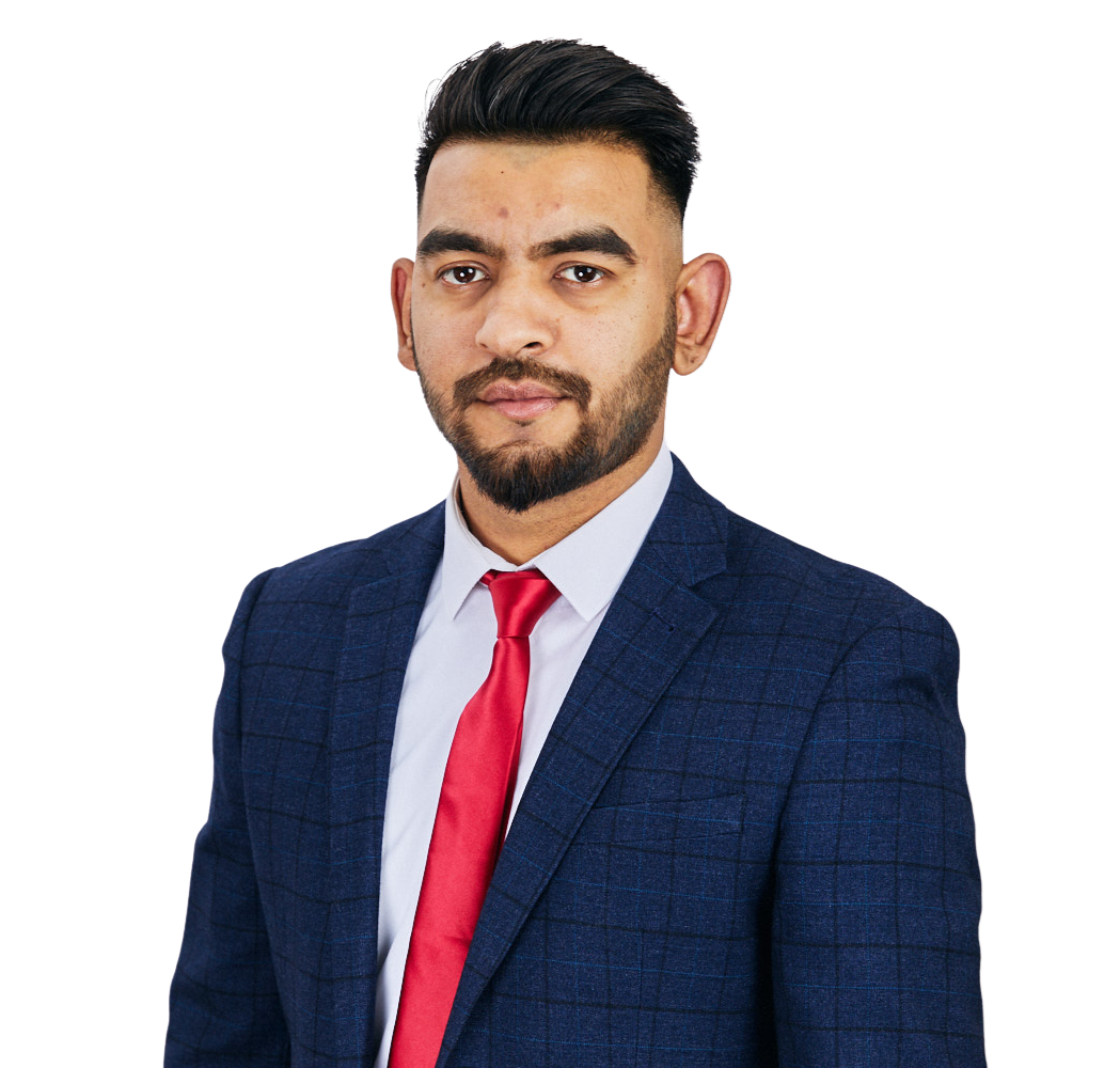 A man with a beard is wearing a blue suit and red tie.