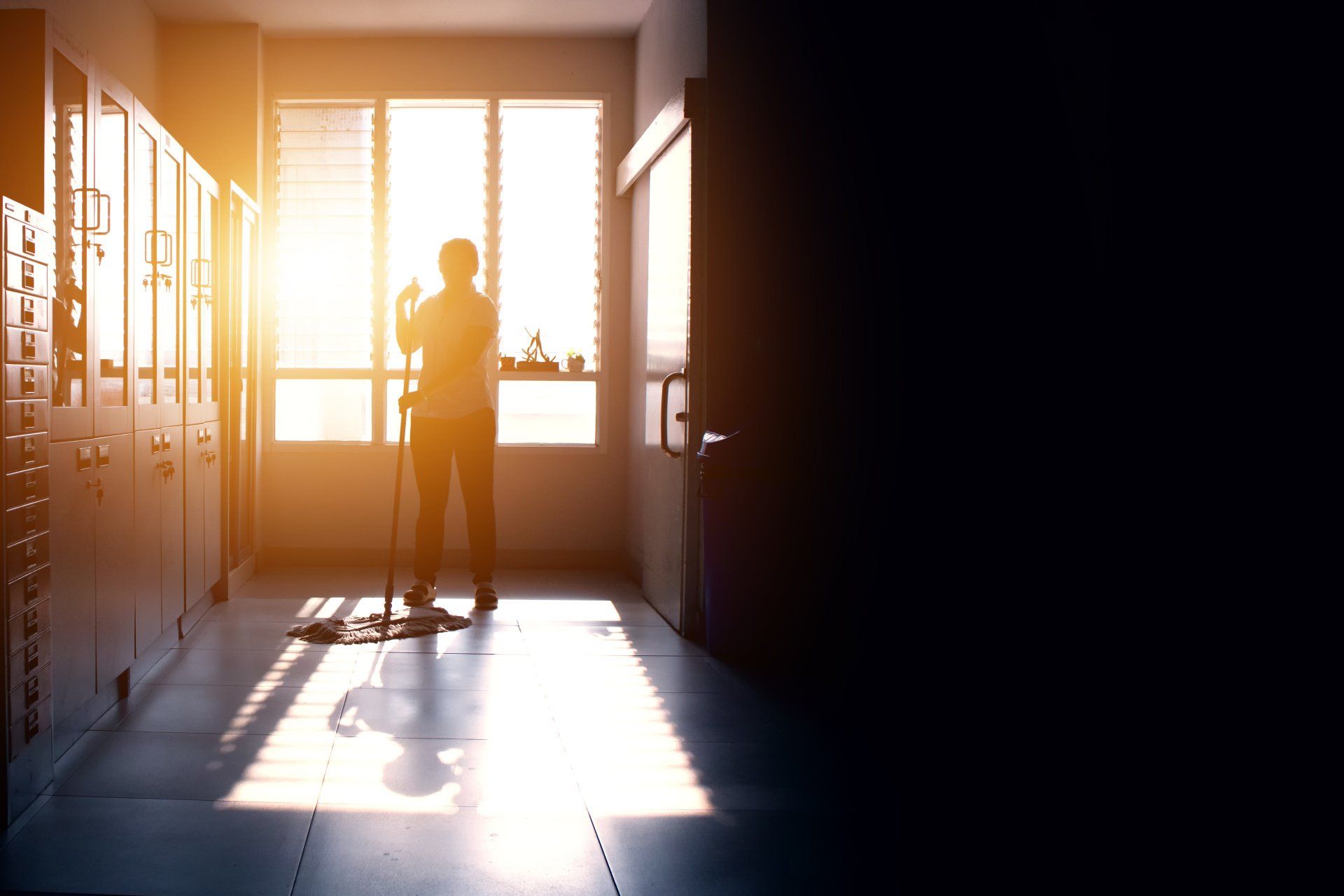 School corridor being cleaned against sunset