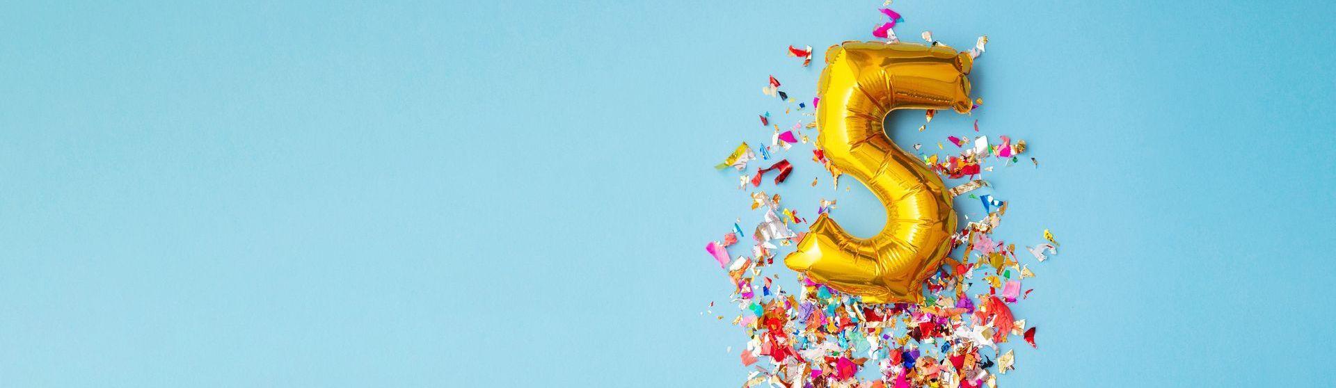 The word anniversary is written in gold on a white background.