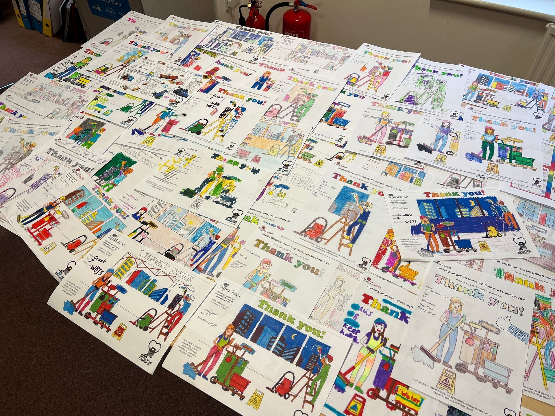A bunch of thank you cards are on a table
