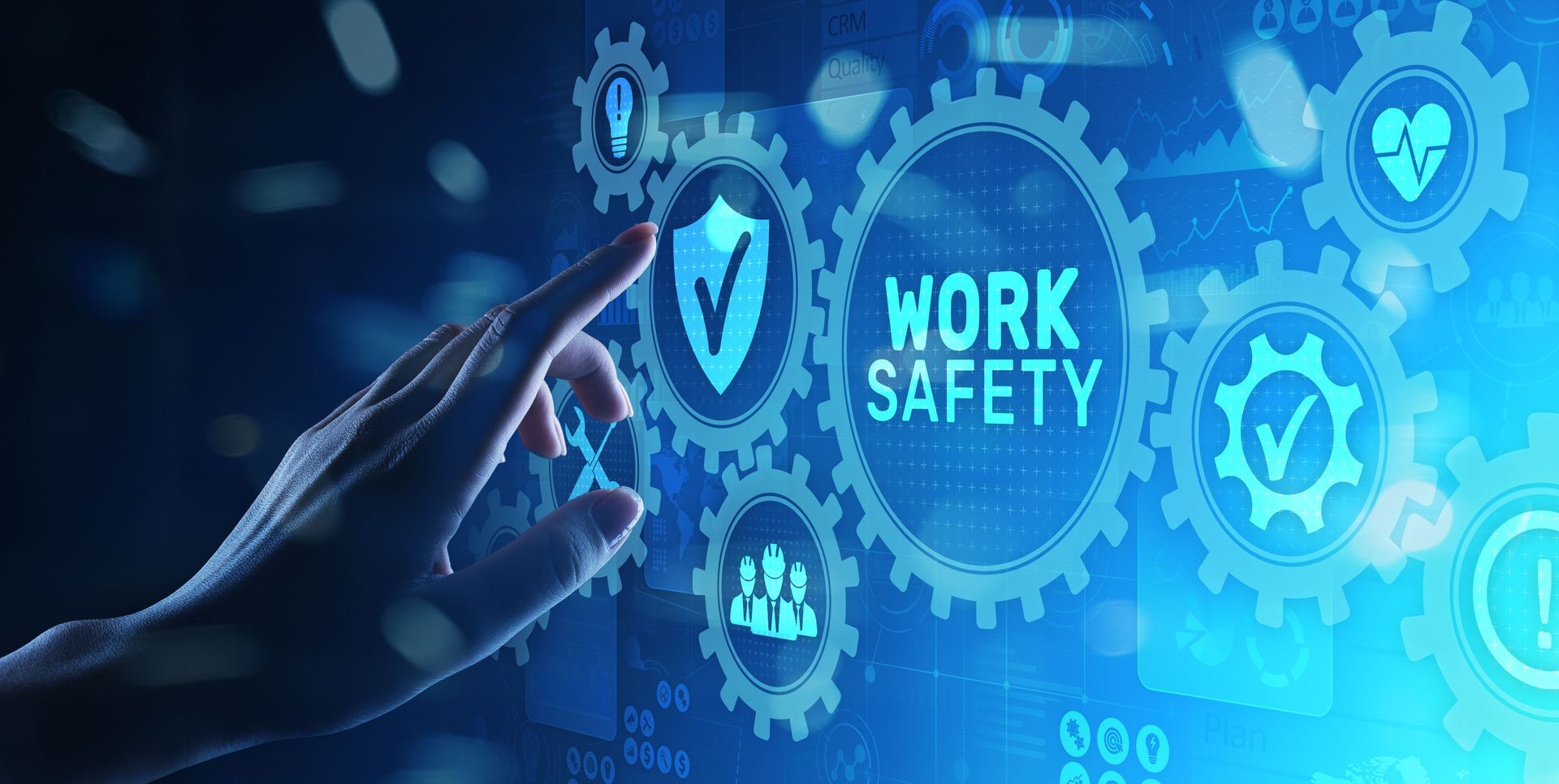 A person is pressing a button on a screen that says `` work safety ''.