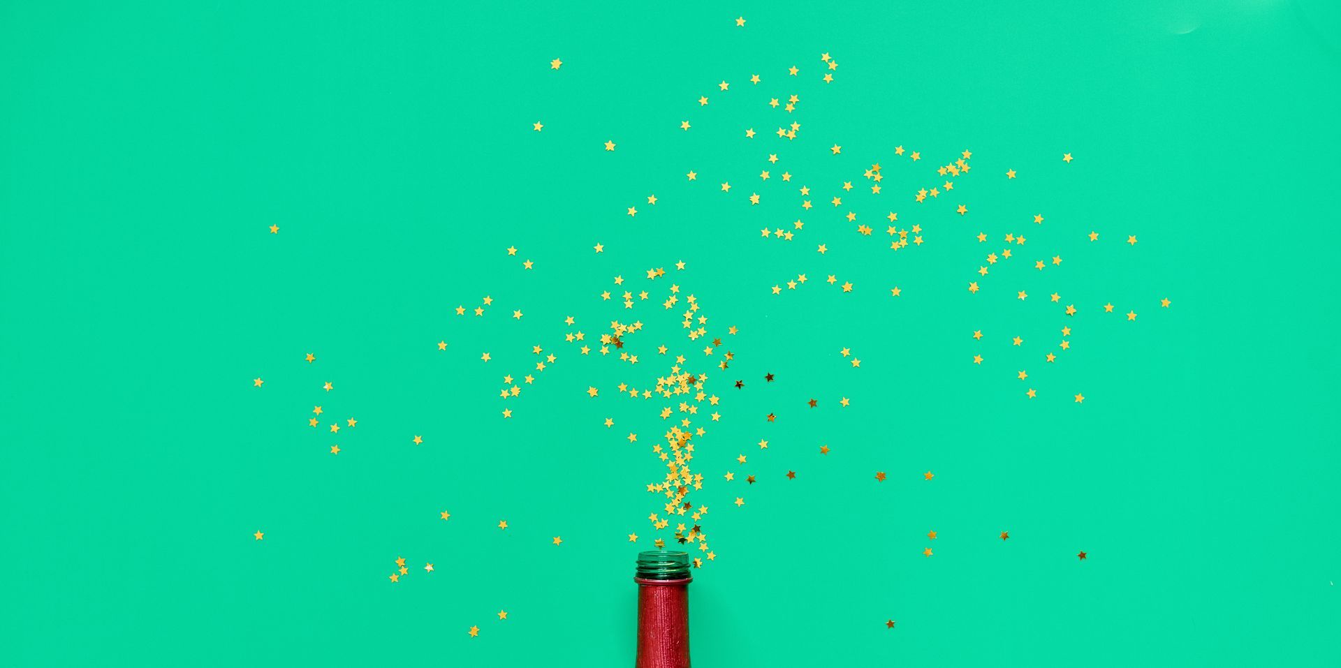 Green background stars coming out of bottle