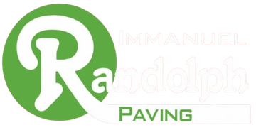 Green Randolph Paving logo with a large white &ldquo;R&rdquo; and green &ldquo;PAVING&rdquo; text
