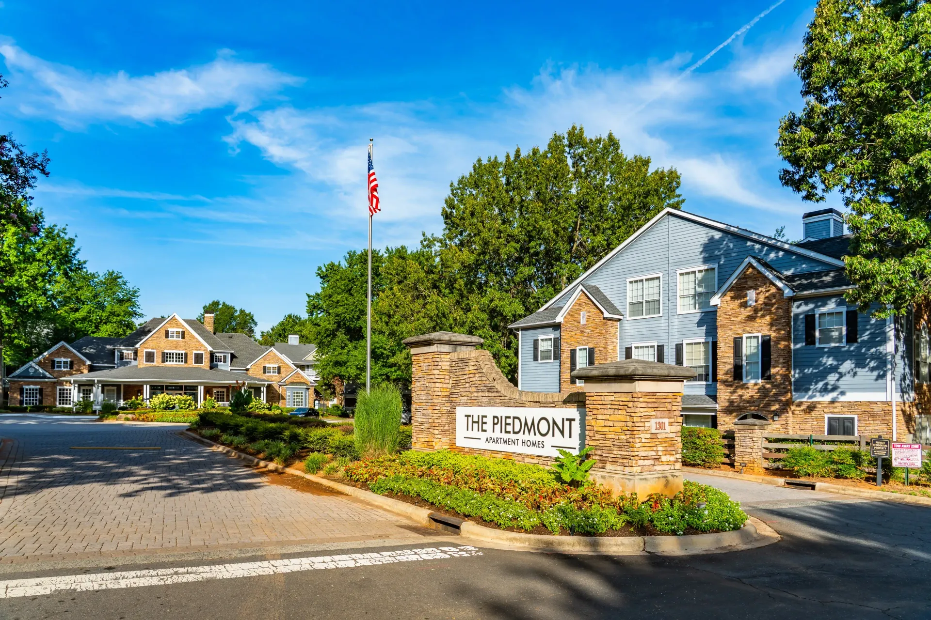 The Piedmont Apartment Homes entrance sign and buildings.