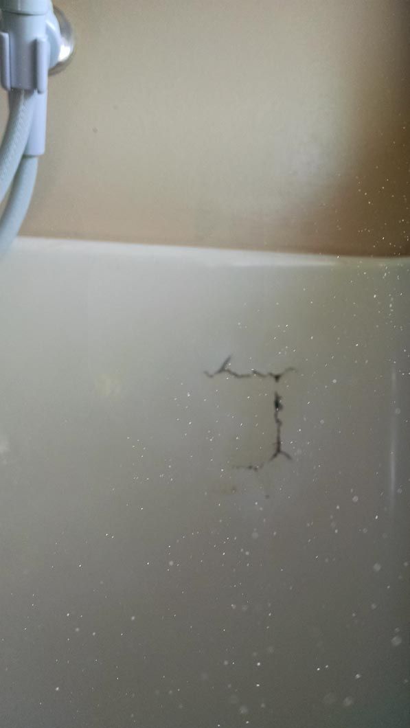 Before - Cracked Bathtub
