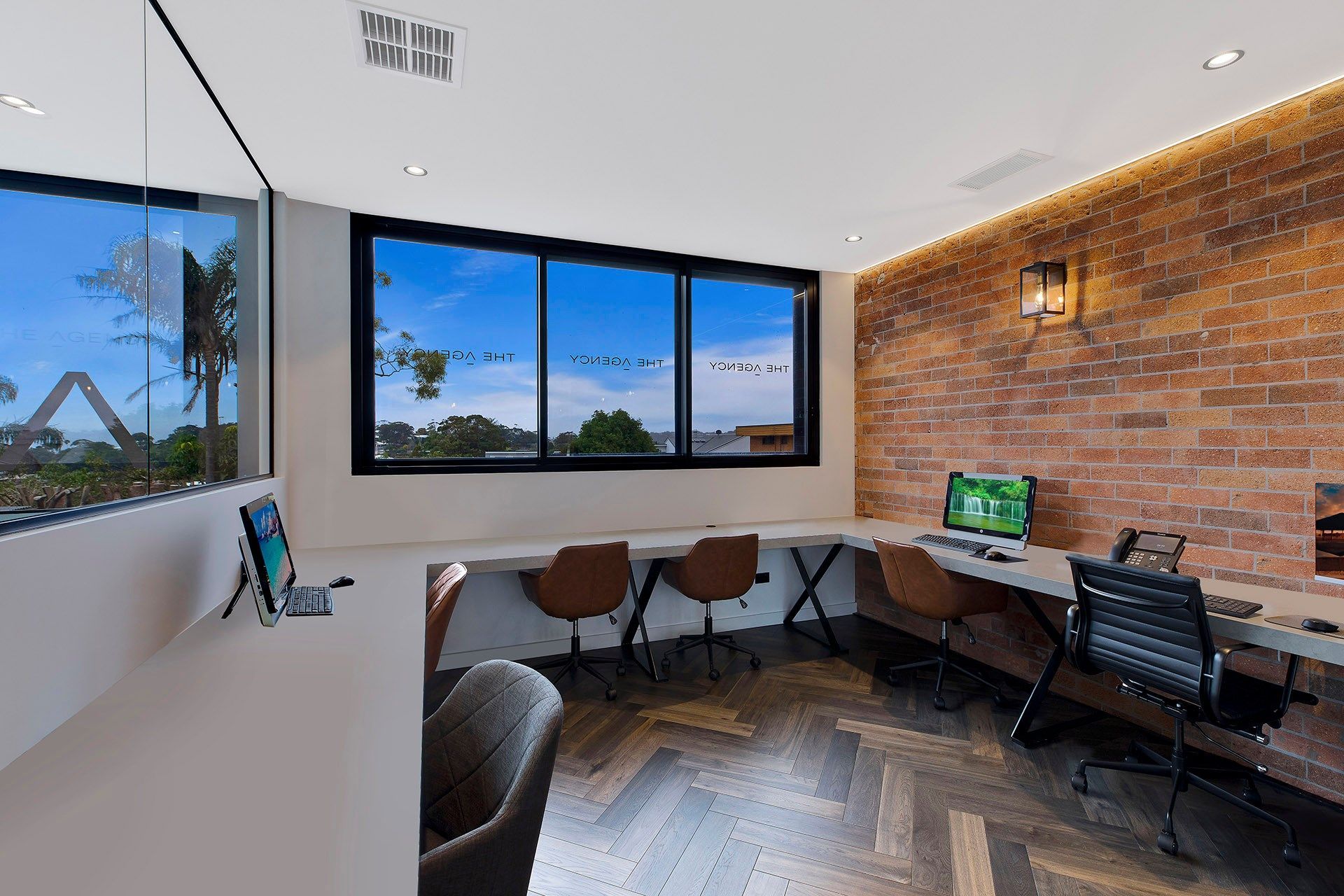 A Modern Office Workspace With a Long Desk — Trim Joinery In Singleton, NSW