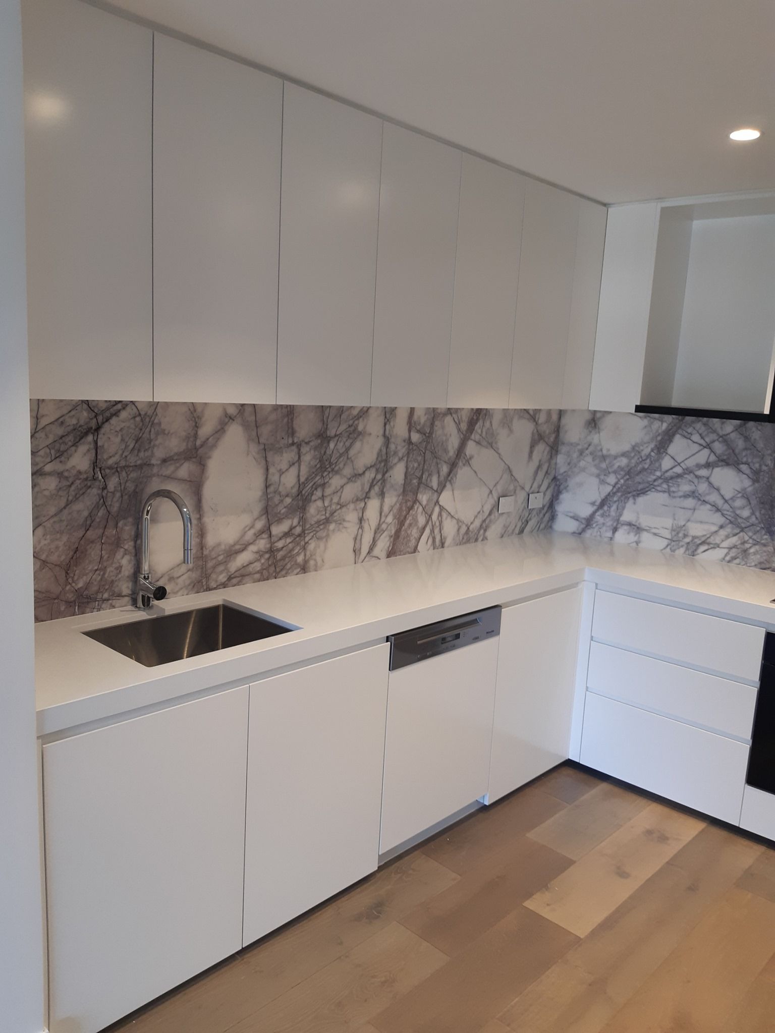 Modern Kitchen With White Cabinets — Trim Joinery In Fountaindale, NSW