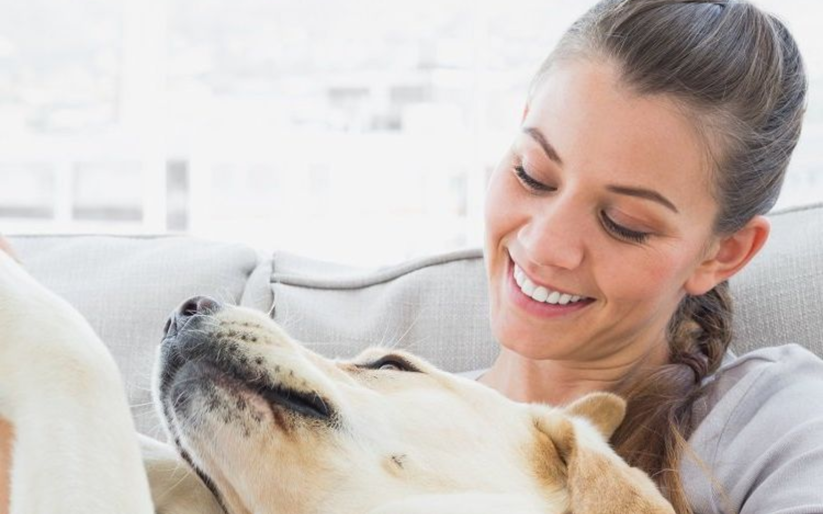 smiling woman with her dog