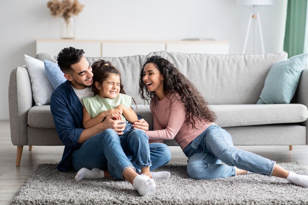 Happy family on a clean carpet