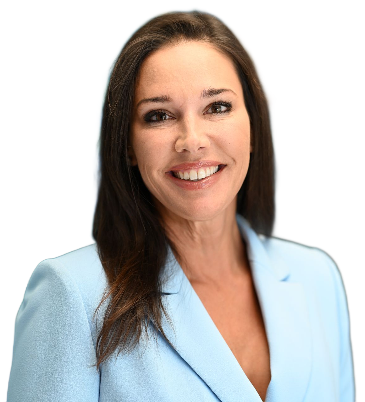 Woman in light blue blazer smiles at the camera.